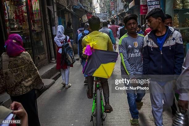 People take part at Shakrain festival in Dhaka on January 14, 2016.Shakrain is known as the kite festival in Bangladesh. Especially southern part of...