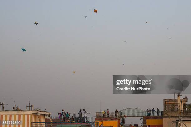 People take part at Shakrain festival in Dhaka on January 14, 2016.Shakrain is known as the kite festival in Bangladesh. Especially southern part of...