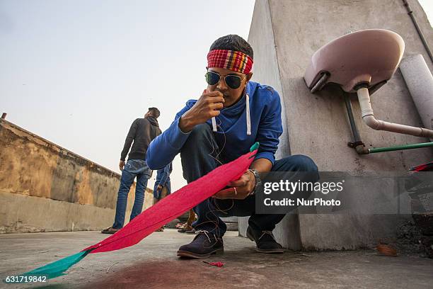 People take part at Shakrain festival in Dhaka on January 14, 2016.Shakrain is known as the kite festival in Bangladesh. Especially southern part of...