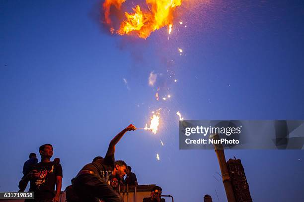 People take part at Shakrain festival in Dhaka on January 14, 2016.Shakrain is known as the kite festival in Bangladesh. Especially southern part of...