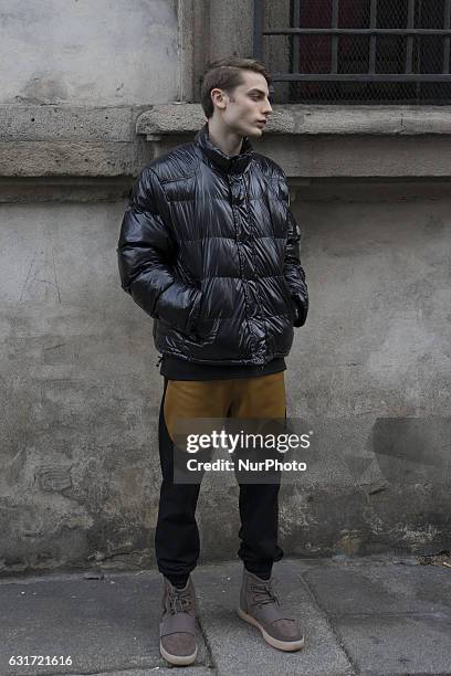 Model attends the Dolce &amp; Gabbana show during Milan Men's Fashion Week Fall/Winter 2017/18 on January 14, 2017 in Milan, Italy.