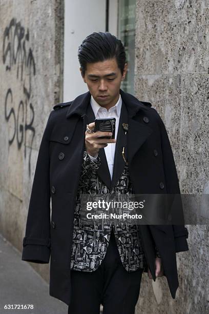 Model attends the Dolce &amp; Gabbana show during Milan Men's Fashion Week Fall/Winter 2017/18 on January 14, 2017 in Milan, Italy.