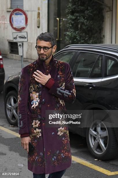 Simone Marchetti is wearing a coat with flower print, glasses is seen at Dolce &amp; Gabbana during Milan Men's Fashion Week Fall/Winter 2017/18 on...