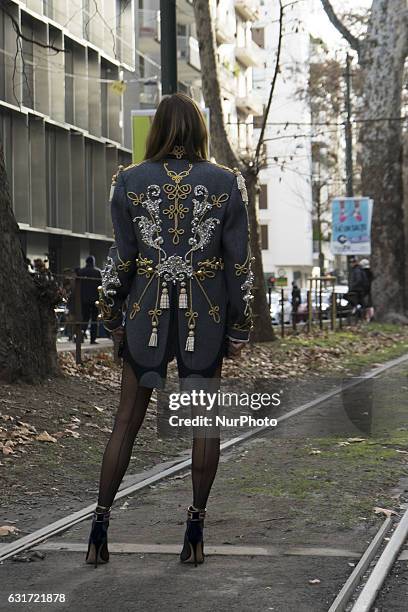 Italian fashion journalist Anna Dello Russo poses before the Dolce &amp; Gabbana show during Milan Men's Fashion Week Fall/Winter 2017/18 on January...