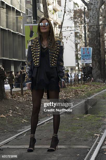 Italian fashion journalist Anna Dello Russo poses before the Dolce &amp; Gabbana show during Milan Men's Fashion Week Fall/Winter 2017/18 on January...