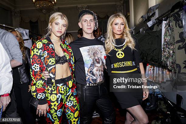 Sofia Richie, Jeremy Scott and Paris Hilton are seen backstage ahead of the Moschino show during Milan Men's Fashion Week Fall/Winter 2017/18 on...