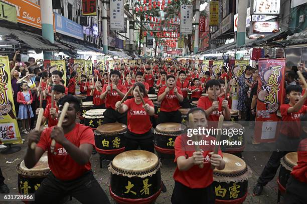 Drummers from SJK Tsun Jin playing in a 24-festive drum performance in Petaling Street in conjunction for the upcoming chinese new year celebration...