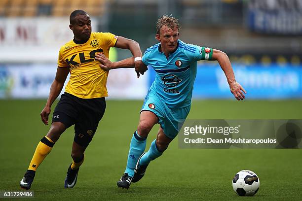 Dirk Kuyt of Feyenoord Rotterdam battles for the ball with Mikhail Rosheuvel of Roda JC during the Dutch Eredivisie match between Roda JC and...