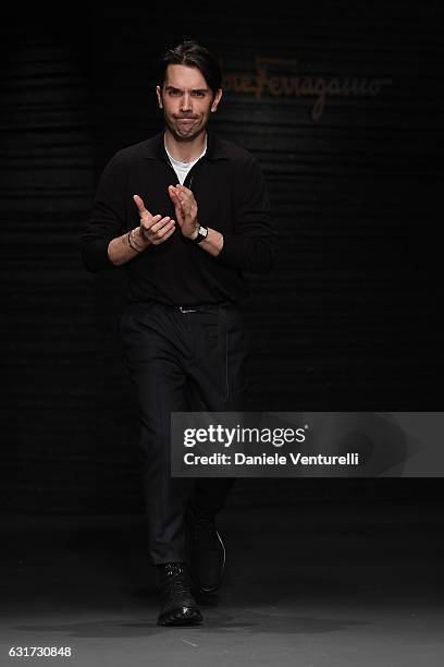 Designer Guillaume Meilland aknowledge the applause of the public after the Salvatore Ferragamo show during Milan Men's Fashion Week Fall/Winter...