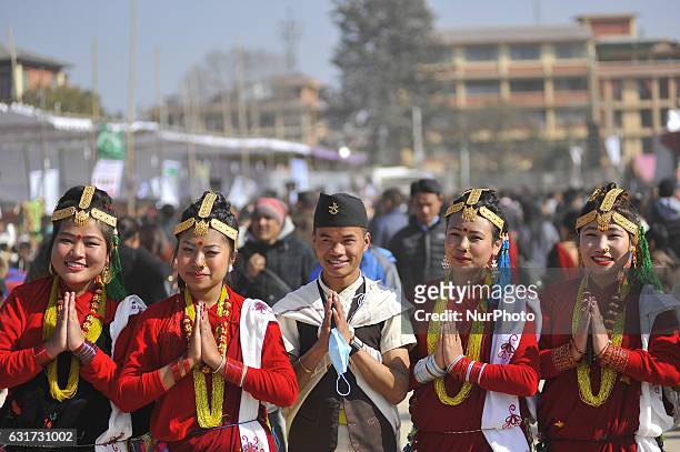 Nepalese Magar community people in a traditional attire during prade of the Maghi festival celebrations, or the New Year of the Tharu community at...