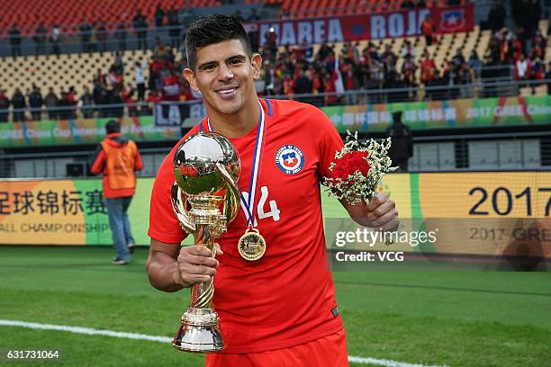 Esteban Pavez of Chile celebrates during the awards ceremony after winning the final match against Iceland during 2017 Gree China Cup International...