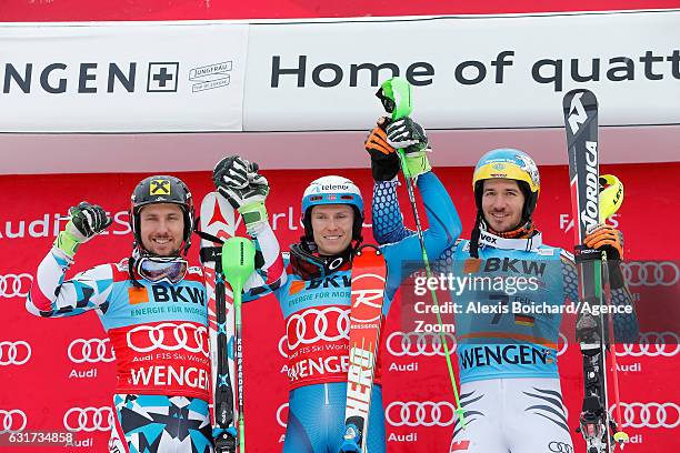 Marcel Hirscher of Austria takes 2nd place, Henrik Kristoffersen of Norway takes 1st place, Felix Neureuther of Germany takes 3rd place during the...