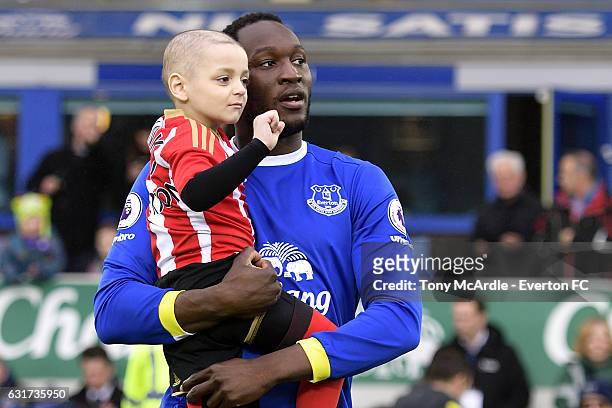 Young Sunderland fan Bradley Lowery is brought onto the pitch by Romelu Lukaku before the Barclays Premier League match between Everton and...
