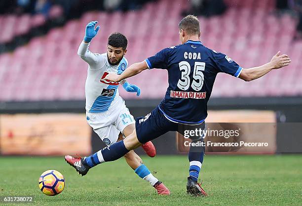 Napolis player Lorenzo Insigne vies with Pescara Calcio player Andrea Coda during the Serie A match between SSC Napoli and Pescara Calcio at Stadio...