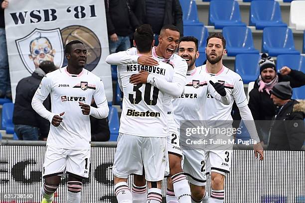 Robin Quaison of Palermo celebrates after scoring the opening goal during the Serie A match between US Sassuolo and US Citta di Palermo at Mapei...