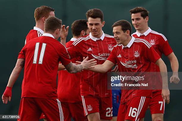 Players of Aberdeen FC celebrate the first goal during the friendly match between Aberdeen FC and FC Bunyodkor at the Jebel Ali Centre of Excellence...