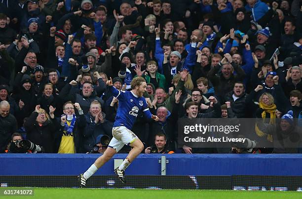 Tom Davies of Everton celebrates after scoring his team's third goal during the Premier League match between Everton and Manchester City at Goodison...