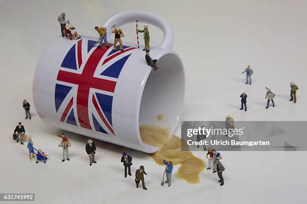 Hard Brexit soft Brexit? Waiting for the decisions of the British government. The photo shows an overturned coffee cup with British flag and...