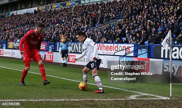 Bolton Wanderers' Zach Clough and Swindon Town's Ben Gladwin during the Sky Bet League One match between Bolton Wanderers and Swindon Town at Macron...