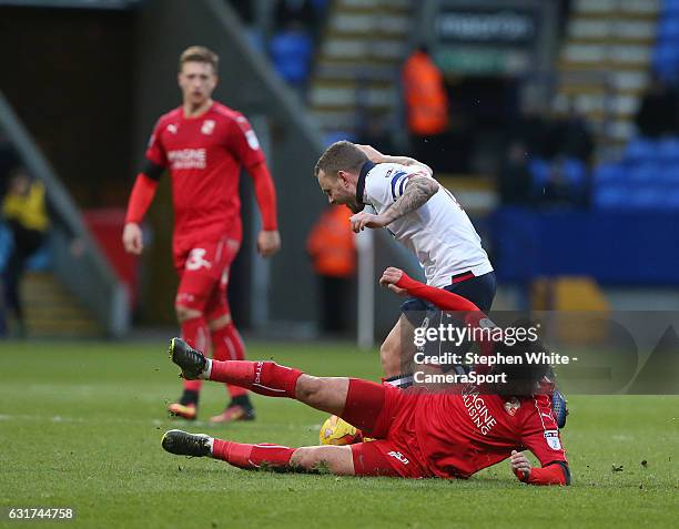 Bolton Wanderers' Jay Spearing is tackled by Swindon Town's Yaser Kasim during the Sky Bet League One match between Bolton Wanderers and Swindon Town...