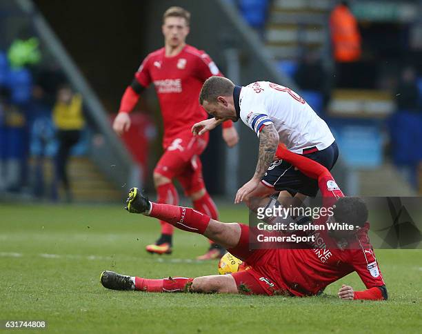 Bolton Wanderers' Jay Spearing is tackled by Swindon Town's Yaser Kasim during the Sky Bet League One match between Bolton Wanderers and Swindon Town...