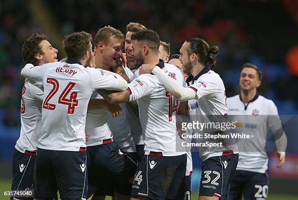 Bolton Wanderers' David Wheater celebrates scoring the opening goal with team-mates during the Sky Bet League One match between Bolton Wanderers and...