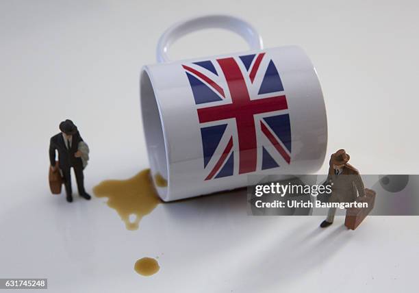 Hard Brexit soft Brexit? Waiting for the decisions of the British government. The photo shows an overturned coffee cup with British flag and...