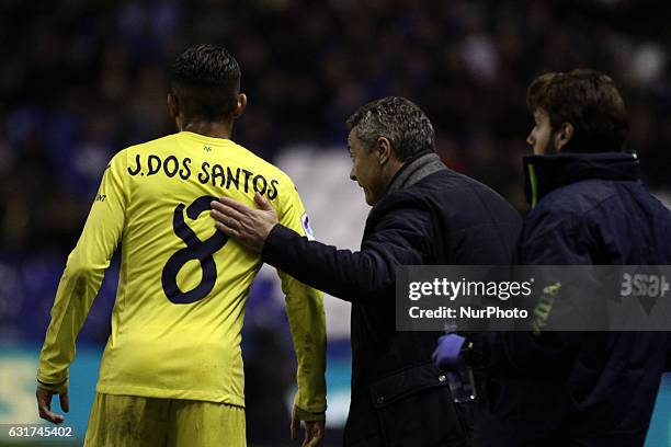 Fran Escribá coach of Villareal Club de Futbol talks with Jonathan Dos Santos of Villareal Club de Futbol during the spanish league, La Liga...