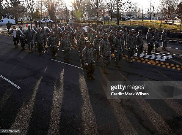 Members of the U.S. Military march down Pennsylvania Ave. During an inaugural parade rehearsal on January 15, 2017 in Washington, DC. On January 20...