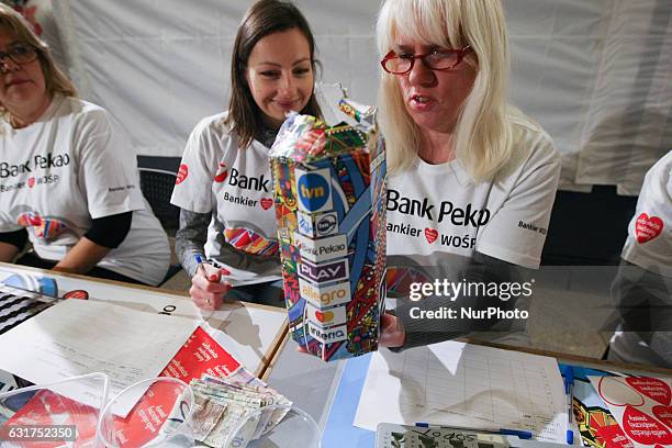 Volunteers counting the collected money are seen during 25th Grand Finale of Great Orchestra of Christmas Charity on January 15th, 2017 in Gdansk....