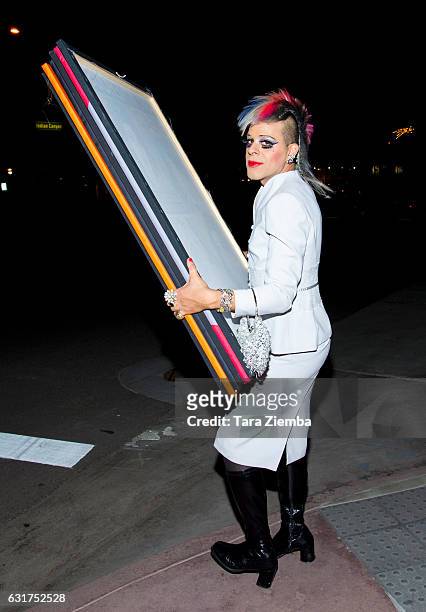 Personality/Pop artist Sham Ibrahim arrives for his unveiling of a Donald Trump portrait at Oscar's on January 14, 2017 in Palm Springs, California.