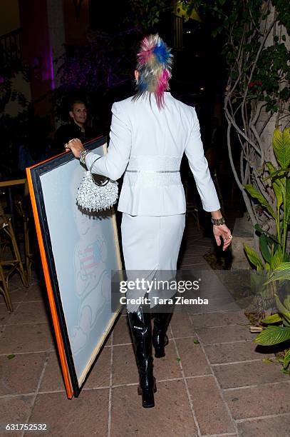 Personality/Pop artist Sham Ibrahim arrives for his unveiling of a Donald Trump portrait at Oscar's on January 14, 2017 in Palm Springs, California.