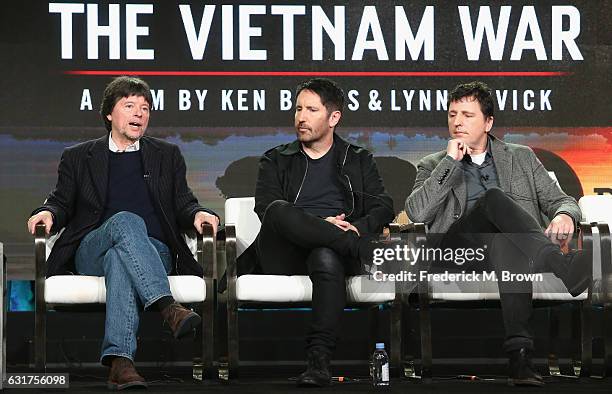 Filmmaker Ken Burns, composer Trent Reznor and composer Atticus Ross of 'THE VIETNAM WAR' speak onstage during the PBS portion of the 2017 Winter...