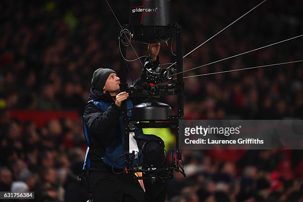 Maintenance is perform on the spidercam during the Premier League match between Manchester United and Liverpool at Old Trafford on January 15, 2017...