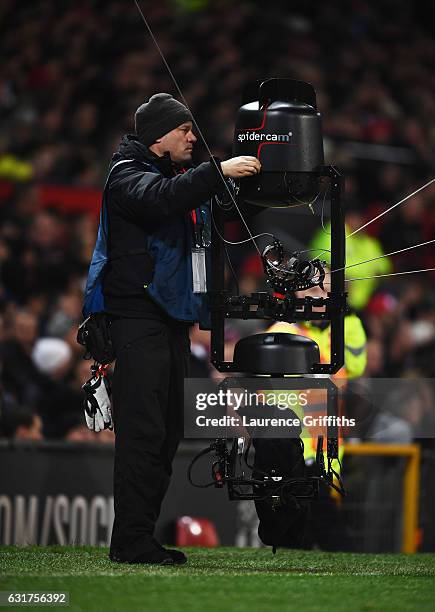 Maintenance is perform on the spidercam during the Premier League match between Manchester United and Liverpool at Old Trafford on January 15, 2017...