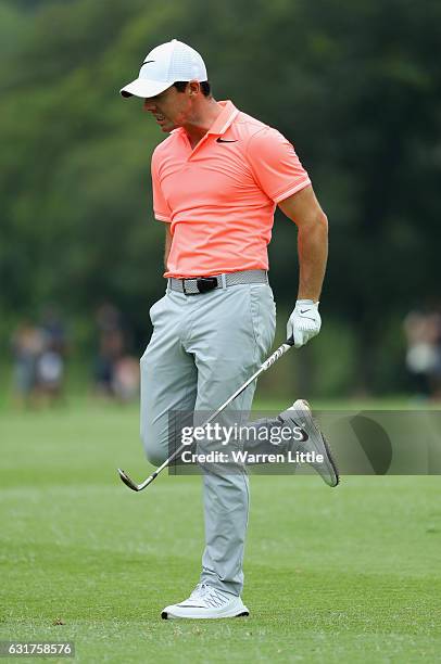 Rory McIlroy of Northern Ireland reacts to his secon shot into 18th green during the final round of the BMW South African Open Championship at...