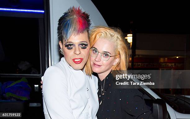 Personality/pop artist Sham Ibrahim and singer Katy Perry pose for a photo with a Donald Trump portrait at Oscar's on January 14, 2017 in Palm...