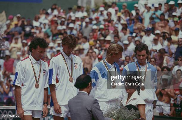 Joint bronze medalists in the tennis Men's Doubles receive their medals at the Vall d'Hebron complex on Montjuïc during the Olympic Games in...