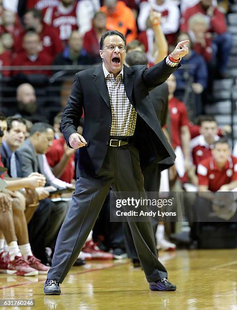 Tom Crean the head coach of the Indiana Hoosiers gives instructions to his team during the game against the Rutgers Scarlet Knights at Assembly Hall...