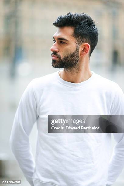 Anil Brancaleoni, life style blogger and Youtuber from the channel Wartek, is wearing Tod's brown denim shoes, Replay black pants, and a Basus white...