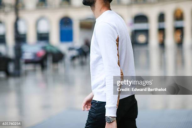 Anil Brancaleoni, life style blogger and Youtuber from the channel Wartek, is wearing Tod's brown denim shoes, Replay black pants, and a Basus white...