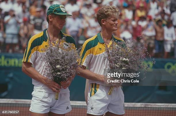 Silver medalists in the tennis Men's Doubles, Piet Norval and Wayne Ferreira of South Africa at the final during the Olympic Games in Barcelona,...
