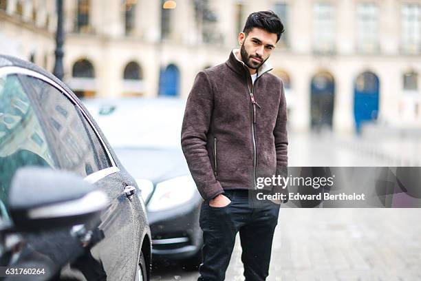 Anil Brancaleoni, life style blogger and Youtuber Wartek, is wearing Tod's brown denim shoes, Replay black pants, and a Napapijri coat, on January...