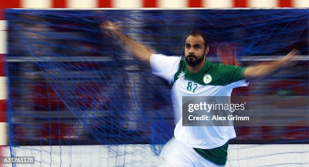 Mohammed Alzaer of Saudi Arabia celebrates a goal during the 25th IHF Men's World Championship 2017 match between Saudi Arabia and Belarus at...