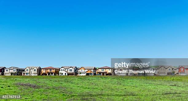 suburban houses - homes in a row stock pictures, royalty-free photos & images