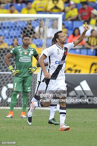 Vasco da Gama's Nene celebrates a goal against against Barcelona S.C., goalkeeper Maximo Banguera in the first half of the quarter-finals of a...