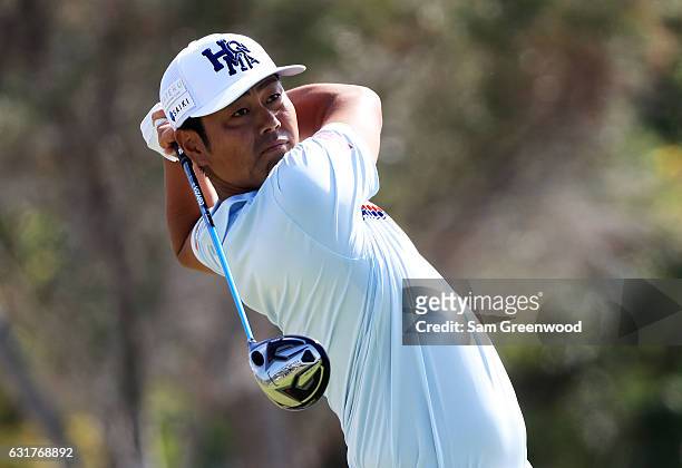 Hideto Tanihara of Japan plays his shot from the first tee during the final round of the Sony Open In Hawaii at Waialae Country Club on January 15,...