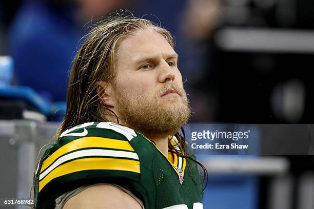 Clay Matthews of the Green Bay Packers sits on the sideline before the NFC Divisional Playoff Game against the Dallas Cowboys at AT&T Stadium on...