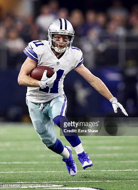 Cole Beasley of the Dallas Cowboys runs with the ball in the first half during the NFC Divisional Playoff Game against the Green Bay Packers at AT&T...