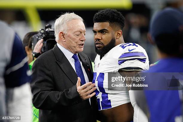 Dallas Cowboys owner Jerry Jones talks with Ezekiel Elliott of the Dallas Cowboys before the NFC Divisional Playoff Game against the Green Bay...